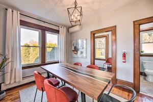 a dining room with a table and chairs at Bright and Sunny Abode, 2 Mi to Hersheypark! in Hershey