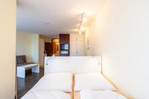 En eller flere senge i et værelse på Ferienwohnpark Immenstaad am Bodensee Ein-Zimmer-Apartment 55 11
