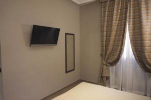 TV a/nebo společenská místnost v ubytování Hotel Taormina
