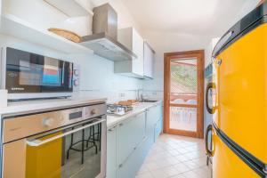 Cucina o angolo cottura di Costa Rei - Belvedere panoramico - A/C