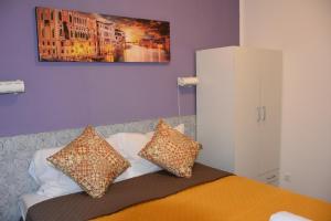 Postel nebo postele na pokoji v ubytování Venice Stay