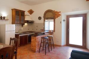 Η κουζίνα ή μικρή κουζίνα στο A Casa di Nicola - Goelba +17 φωτογραφίες