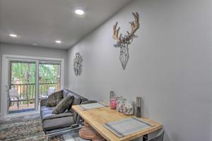 A seating area at Unique Container Studio with Deck and Fire Pit!
