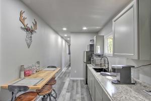 A kitchen or kitchenette at Unique Container Studio with Deck and Fire Pit!