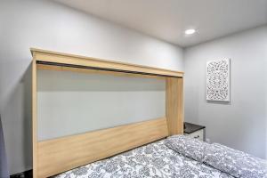 A bed or beds in a room at Unique Container Studio with Deck and Fire Pit!
