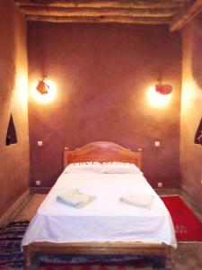 Katil atau katil-katil dalam bilik di Authentic riad & activities Erg