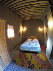 Katil atau katil-katil dalam bilik di Authentic riad & activities Erg