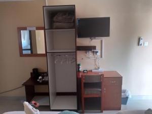 TV a/nebo společenská místnost v ubytování Impovu Guest House