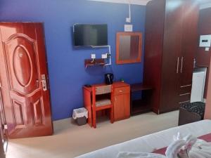 TV a/nebo společenská místnost v ubytování Impovu Guest House