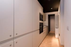 Kuchyň nebo kuchyňský kout v ubytování Brera Premium Apartment near Duomo Wifi