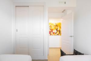 Posteľ alebo postele v izbe v ubytovaní Magnífico apartamento en el Rincón by Renthas