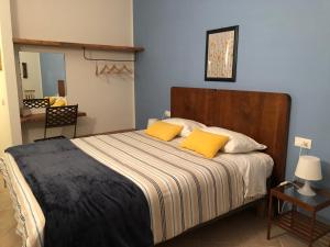 En eller flere senge i et værelse på All'Archetto del Terz'Ordine