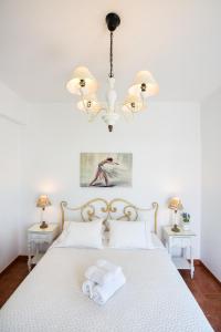 Posteľ alebo postele v izbe v ubytovaní Hotel Odysseus