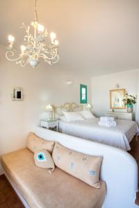Posteľ alebo postele v izbe v ubytovaní Hotel Odysseus