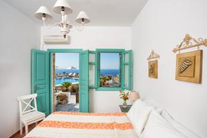 Posteľ alebo postele v izbe v ubytovaní Hotel Odysseus