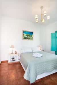 Posteľ alebo postele v izbe v ubytovaní Hotel Odysseus