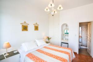 Posteľ alebo postele v izbe v ubytovaní Hotel Odysseus