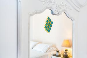 Posteľ alebo postele v izbe v ubytovaní Hotel Odysseus