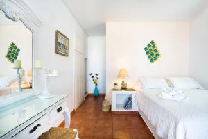 Posteľ alebo postele v izbe v ubytovaní Hotel Odysseus