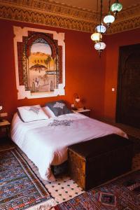 En eller flere senge i et værelse på Riad SOUS LES ETOILES