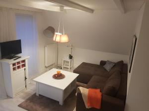 TV a/nebo společenská místnost v ubytování Strandzauber