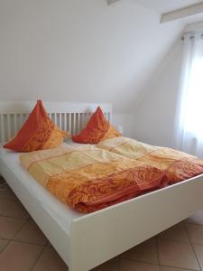 Postel nebo postele na pokoji v ubytování Strandzauber