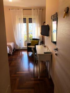 A bed or beds in a room at Rizzi Marianna B&B