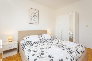 Postel nebo postele na pokoji v ubytování Apartment Starfish Pula