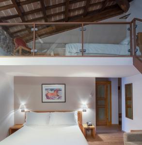 Posteľ alebo postele v izbe v ubytovaní Hotel 99 Cannelle