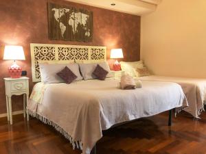 A bed or beds in a room at Rizzi Marianna B&B