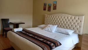 Hotel Mantas Cusco客房内的一张或多张床位