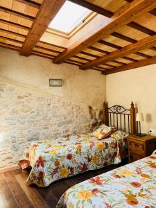 Un pat sau paturi într-o cameră la Casa Cundaro