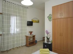 TV a/nebo společenská místnost v ubytování B&B Poliglotta