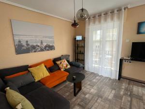 Televízia a/alebo spoločenská miestnosť v ubytovaní Alicante(Santa Pola), Bord de plage, 3 chambres