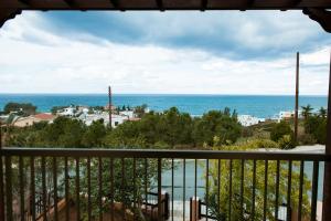 a view of the ocean from a balcony at Seaclusion Vacation Villa in Pomos