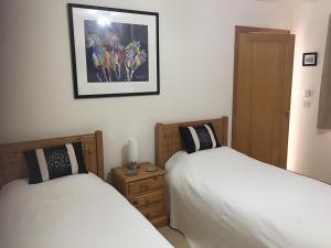En eller flere senge i et værelse på Darach Brae
