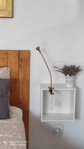 Postel nebo postele na pokoji v ubytování B&B La casina di Iris