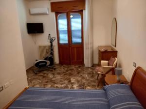 TV a/nebo společenská místnost v ubytování Pensiero di mare + 3 fotografie