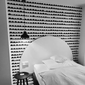Ein Bett oder Betten in einem Zimmer der Unterkunft Hotel Scholz