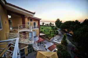 an aerial view of a building with a balcony at Irida Beach Resort Suites in Kyparissia