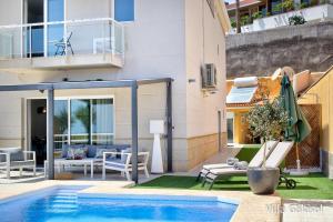 The swimming pool at or close to Villa Galasol with heated pool