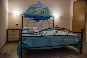 Ліжко або ліжка в номері Casa vacanza le Dune