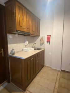 Kuchyň nebo kuchyňský kout v ubytování Amelia Beach Apartments
