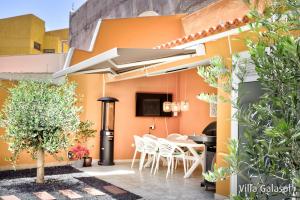 A patio or other outdoor area at Villa Galasol with heated pool