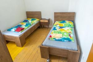 Postel nebo postele na pokoji v ubytování Ubytování na Jakuli