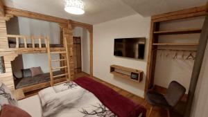 Voodi või voodid majutusasutuse Panorama Berg Chalet toas
