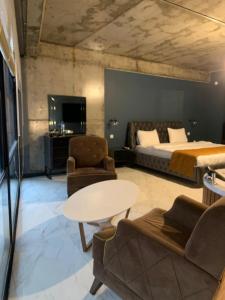 TV a/nebo společenská místnost v ubytování Mas Suites Karaköy
