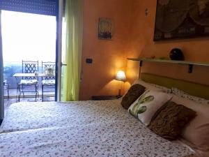 A bed or beds in a room at Rizzi Marianna B&B