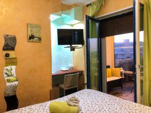 A bed or beds in a room at Rizzi Marianna B&B