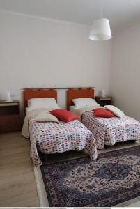 A bed or beds in a room at B&B CASETTA 42